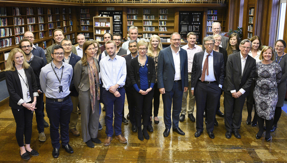 Bill Gates and School staff in the School's library. Anne Koerber / LSHTM